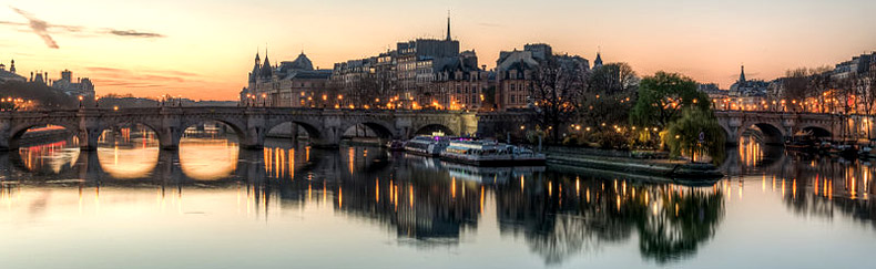 The Ile de la Cite as seen from the Pont des Arts shortly before sunrise.